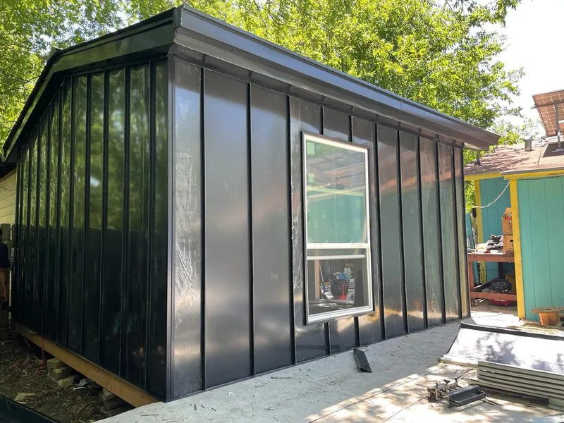 Black standing seam metal wall panels for Roof Inspection in Owensboro