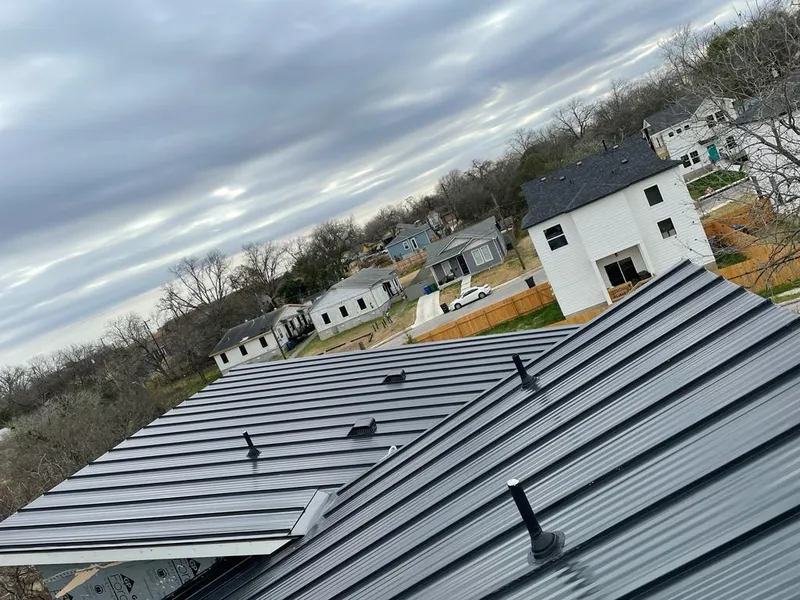 Standing seam metal roof panels with vents for Skylight Repair in Owensboro